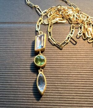 gold lariat with sapphires