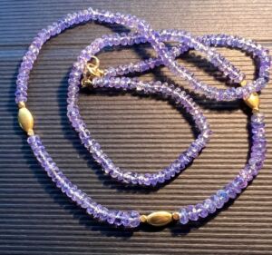 tanzanite necklace with gold beads